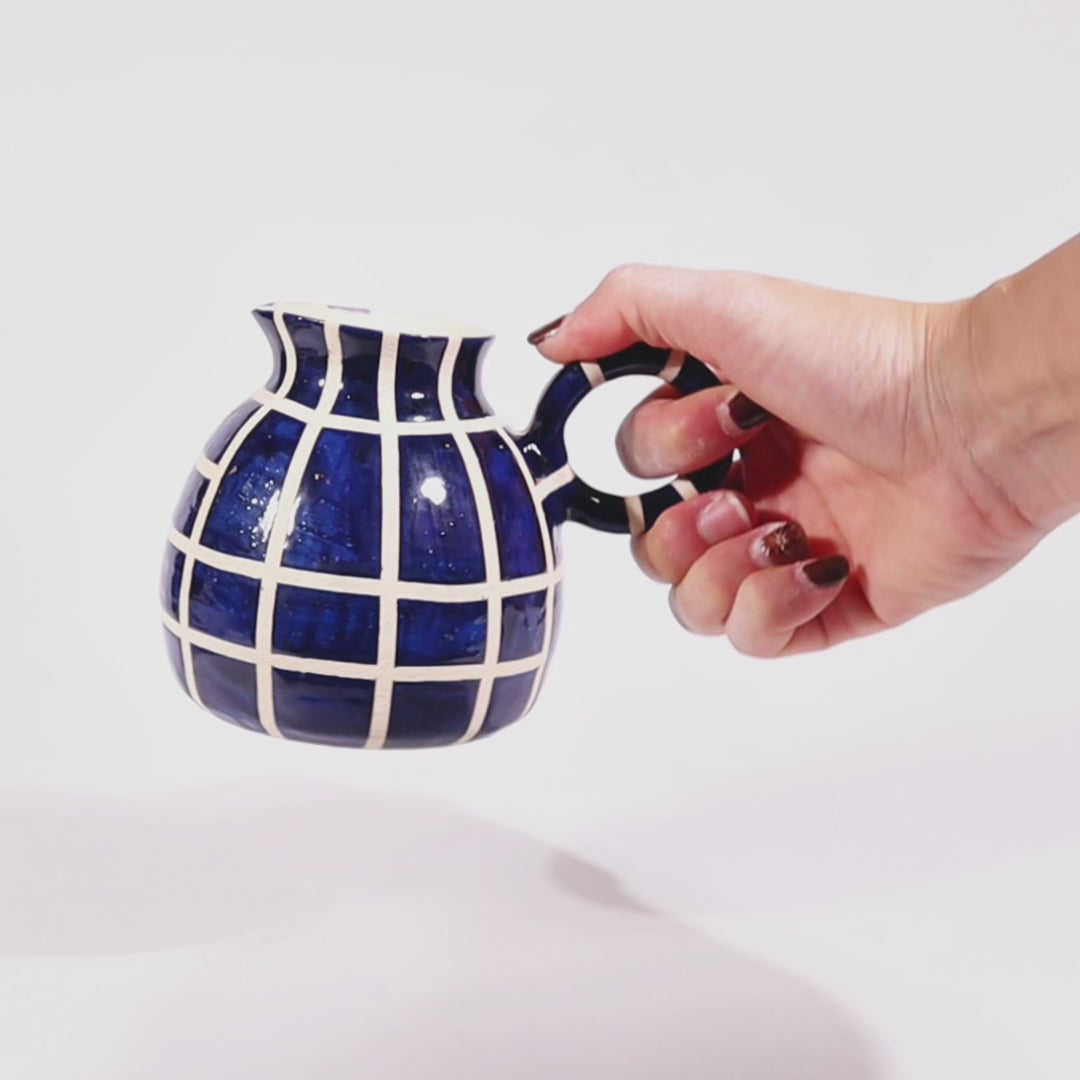 Load video: Mosaic blue and natural ceramic pitcher